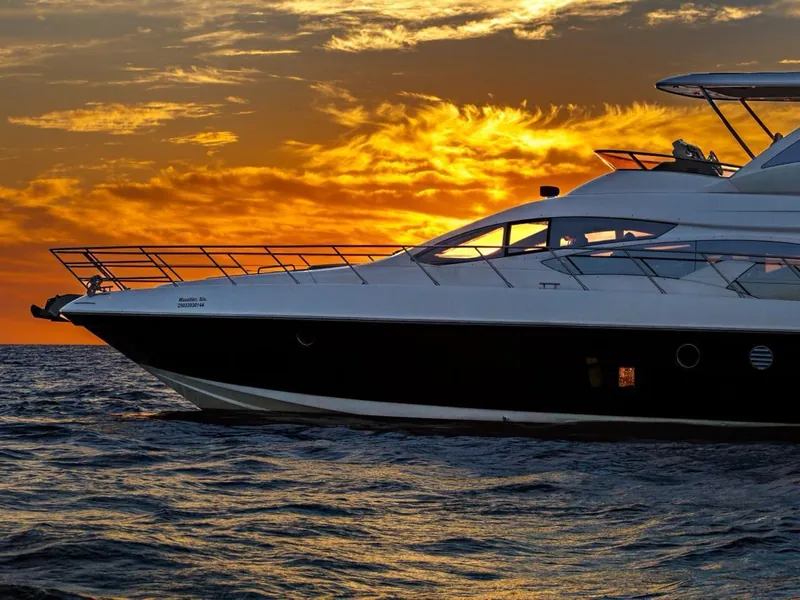 Azimut 70 hull and flybridge against a sunset sky