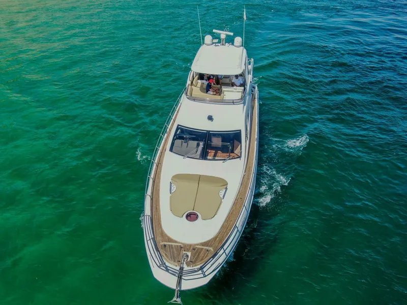 Azimut 70 seen from above, cruising on green water