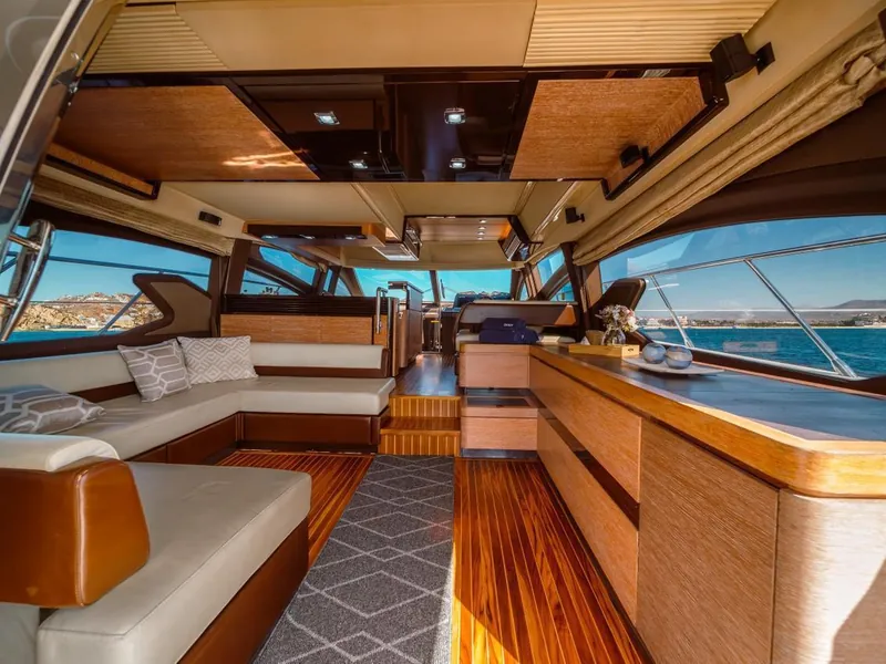 Azimut 70 salon and galley with wood finishes
