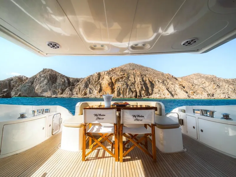 Azimut 70 aft deck table looking at Land's End