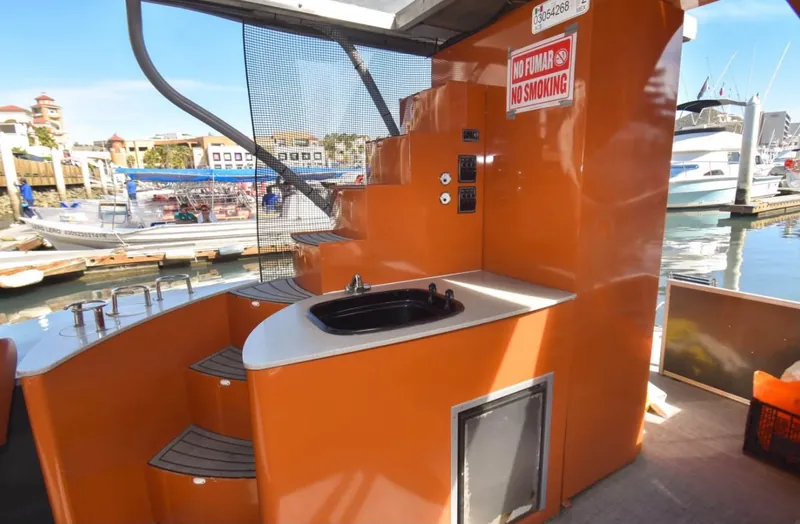 Freshwater sink and stairs to the upper sun deck on the Pontoon 38 party boat